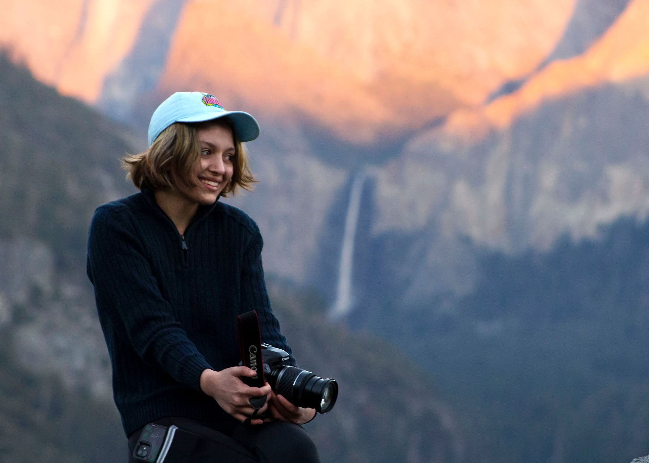 portrait of lily mayo with a camera